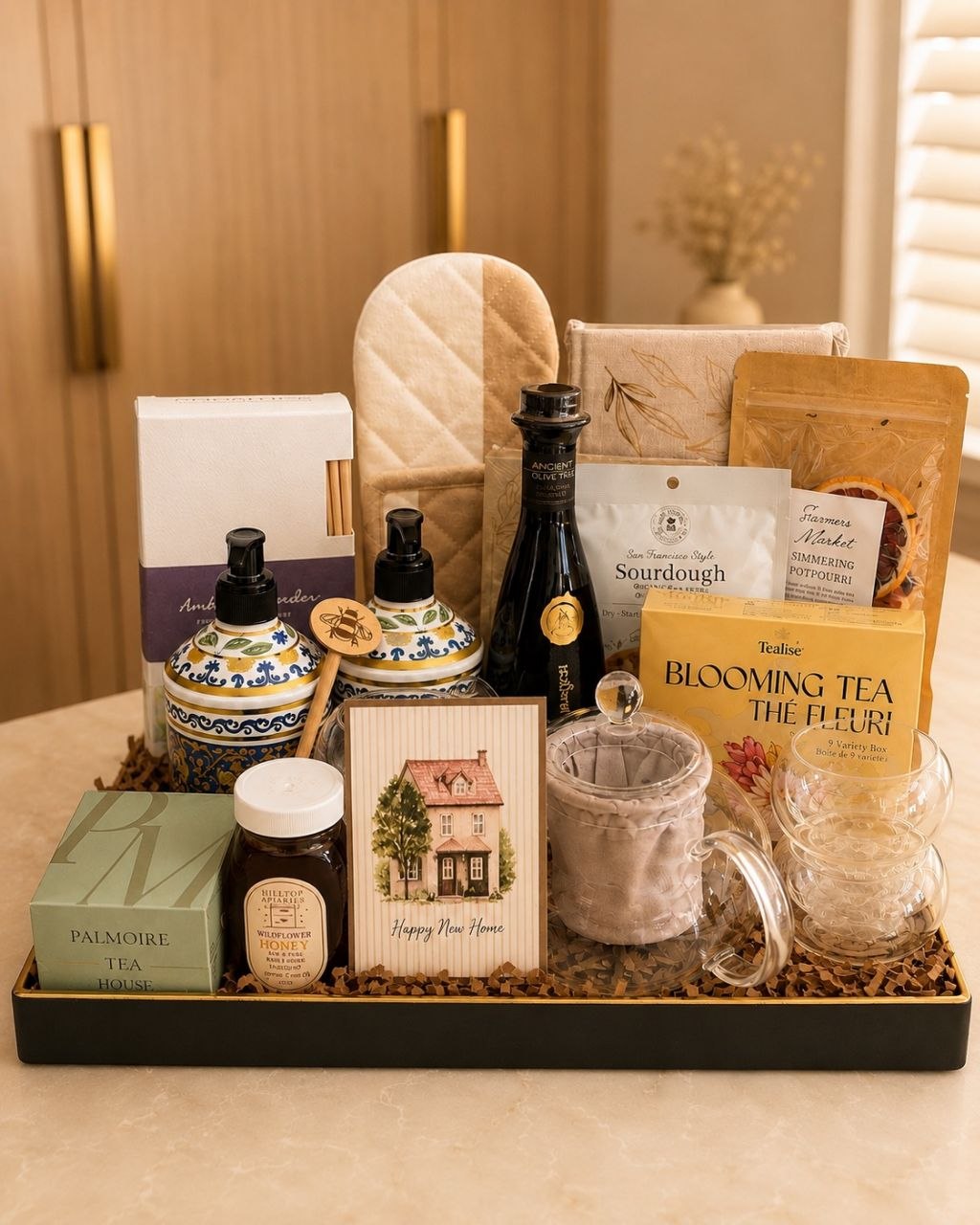 The Estate Collection closing gift collection arranged on a serving tray