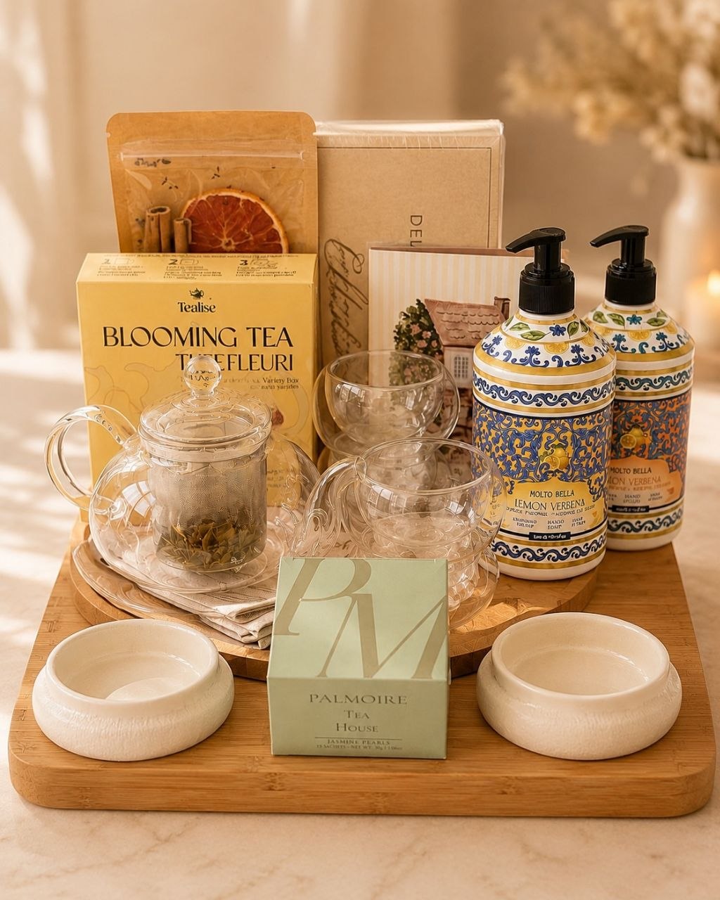The Signature Welcome closing gift collection arranged on a serving tray